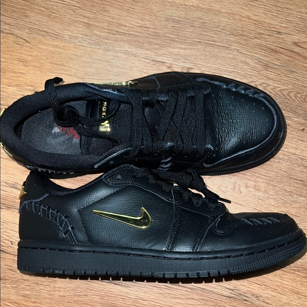 Nike Black Air Jordan with Gold Swoosh